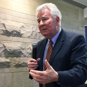 Roger Ames speaking and gesturing